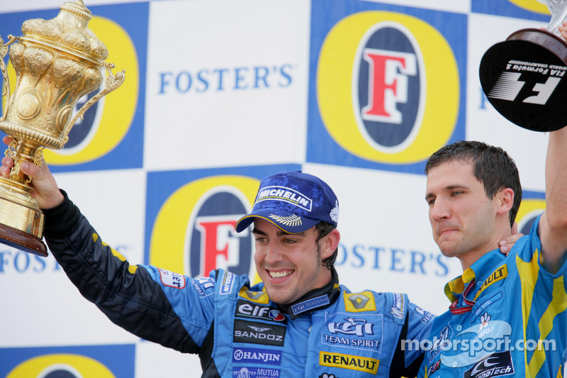 Podium: race winner Fernando Alonso celebrates