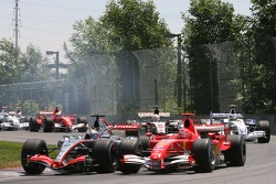 Juan Pablo Montoya and Michael Schumacher battle
