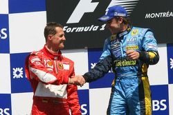 Podium: race winner Fernando Alonso with Michael Schumacher