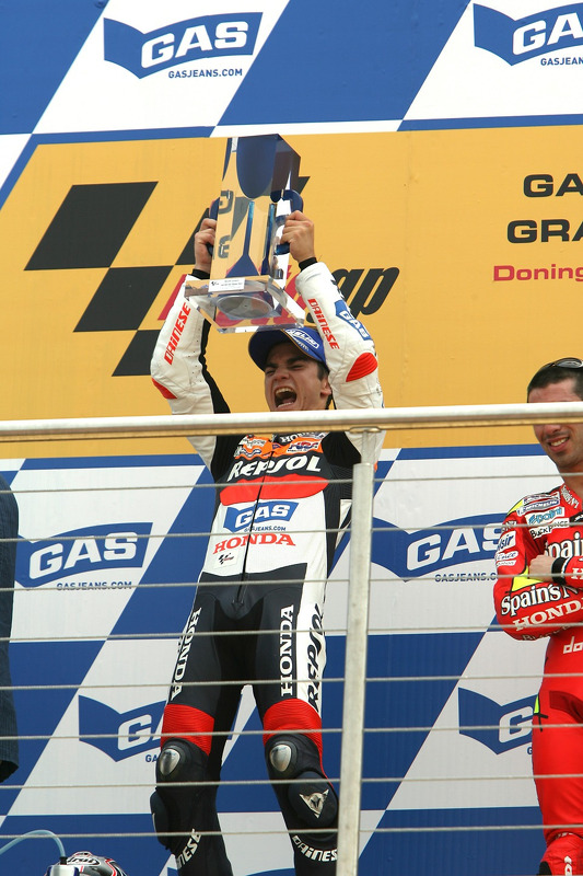 Podium: race winner Dani Pedrosa celebrates