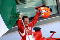 Race winner Michael Schumacher celebrates