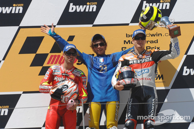 Podium: race winner Valentino Rossi with Marco Melandri and Nicky Hayden