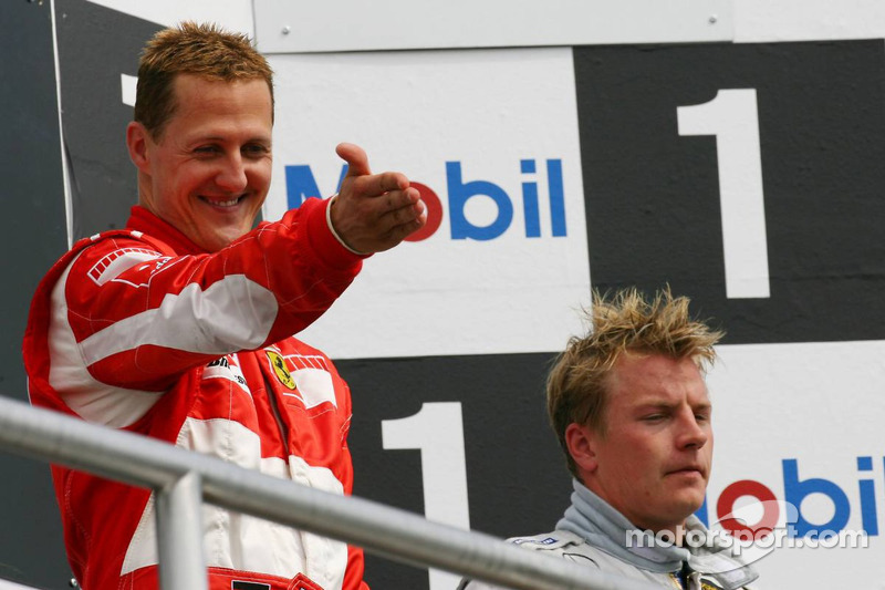 Podio: ganador de la carrera Michael Schumacher con el tercer lugarKimi Raikkonen