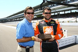IMS President and COO Joie Chitwood presented 2005 Allstate 400 at the Brickyard winner Tony Stewart with a brick from the original track