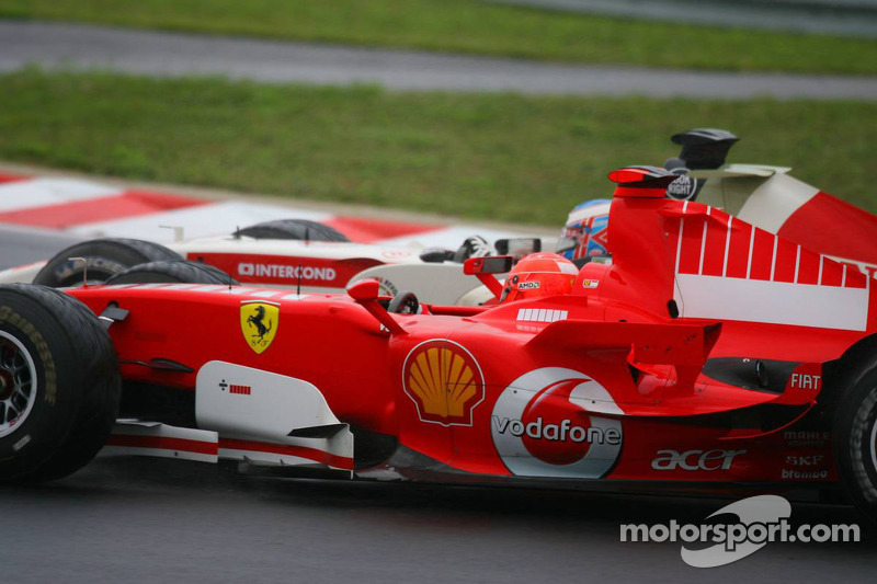 Michael Schumacher and Jenson Button