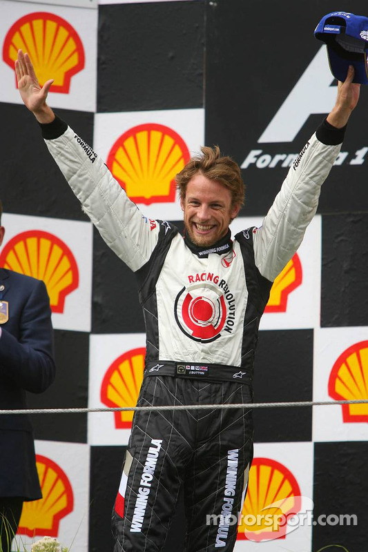 Podium: race winner Jenson Button celebrates