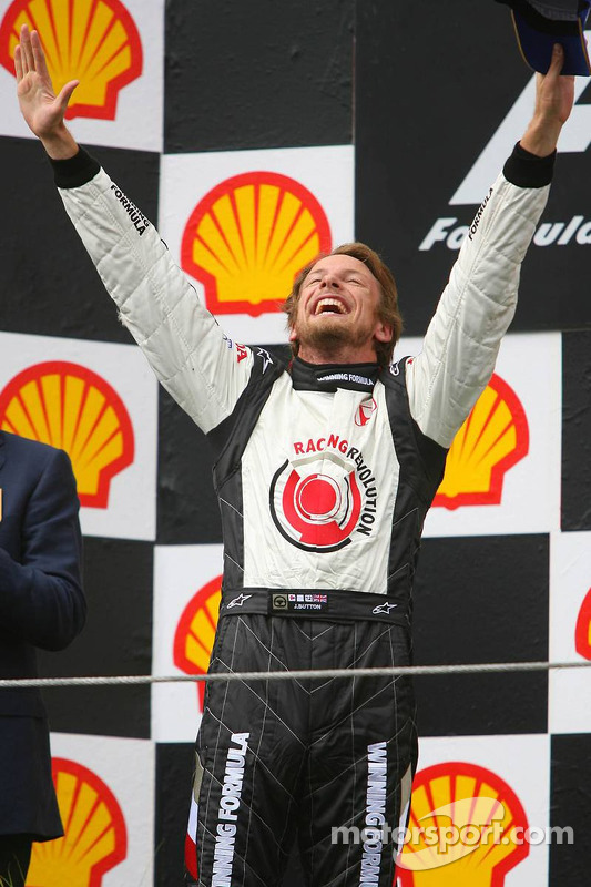 Podium: race winner Jenson Button celebrates