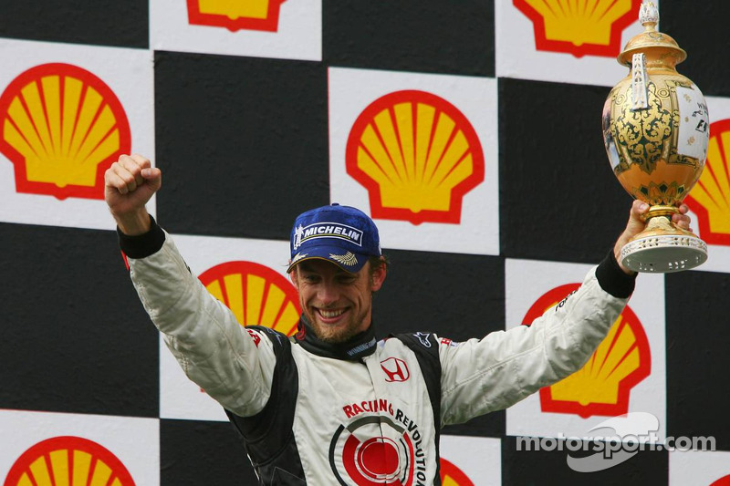 Podium: race winner Jenson Button celebrates