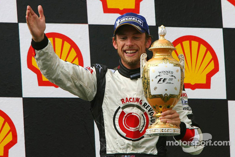Podium: race winner Jenson Button celebrates