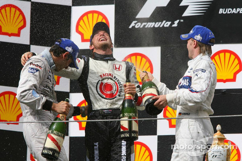 Podium: champagne for Jenson Button, Pedro de la Rosa and Nick Heidfeld