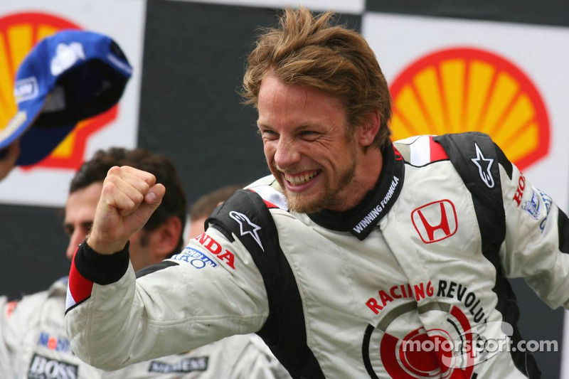 Podium: race winner Jenson Button celebrates