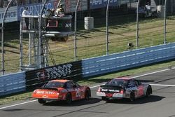 Kevin Harvick passes Tony Stewart for the lead