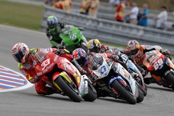 Marco Melandri leads a group of bikes