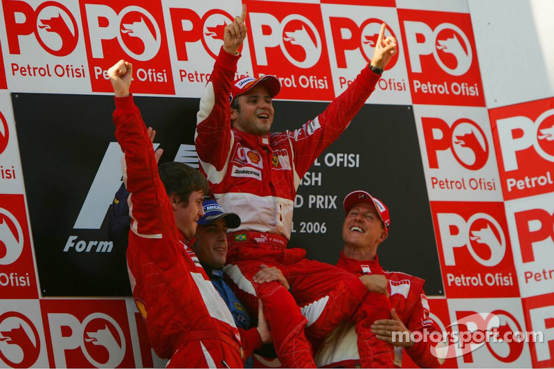 Podium: race winner Felipe Massa with Fernando Alonso and Michael Schumacher