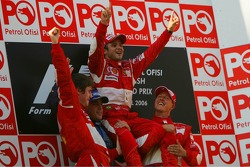 Podium: race winner Felipe Massa with Fernando Alonso and Michael Schumacher