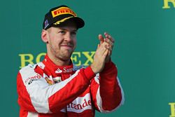 Third place Sebastian Vettel, Ferrari celebrates his third position on the podium