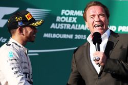 race winner Lewis Hamilton, Mercedes AMG F1 on the podium with Arnold Schwarzenegger