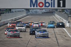 Start: #9 Stevenson Motorsports Camaro Z/28.R: Lawson Aschenbach, Matt Bell memimpin