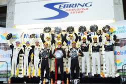 Class winners podium: P class winners Joao Barbosa, Christian Fittipaldi, Sébastien Bourdais, PC class winners Mike Guasch, Andrew Palmer, Tom Kimber-Smith, GTLM class winners Jan Magnussen, Antonio Garcia, Ryan Briscoe, GTD class winners Ian James, Mario