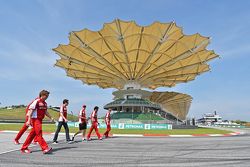Sebastian Vettel, Ferrari and Esteban Gutierrez, Ferrari Test and Reserve Driver walk the circuit
