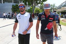 (L to R): Fernando Alonso, McLaren with Carlos Sainz Jr., Scuderia Toro Rosso