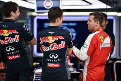 Sebastian Vettel, Ferrari visits the Red Bull Racing pit garage