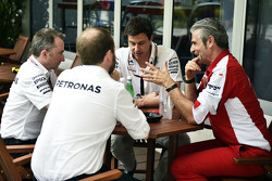 (L to R): Paddy Lowe, Mercedes AMG F1 Executive Director, with Toto Wolff, Mercedes AMG F1 Shareholder and Executive Director and Maurizio Arrivabene, Ferrari Team Principal
