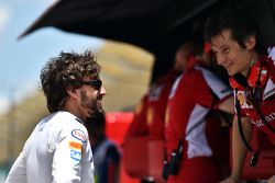 (L to R): Fernando Alonso, McLaren with Massimo Rivola, Ferrari Sporting Director