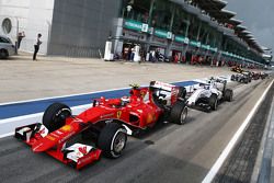 Kimi Raikkonen, Ferrari SF15-T in the queue at the end of the pit lane