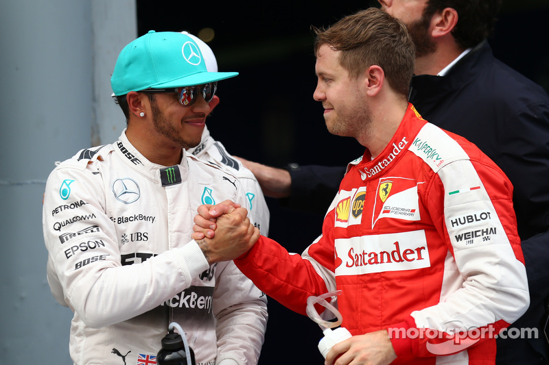 Lewis Hamilton, Mercedes AMG F1 and Sebastian Vettel, Ferrari SF15-T