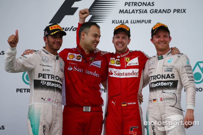 Podium: race winner Sebastian Vettel, Ferrari, second place Lewis Hamilton, Mercedes AMG F1, third p