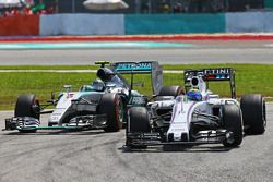 Felipe Massa, Williams FW37 leads Nico Rosberg, Mercedes AMG F1 W06