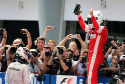 Sebastian Vettel, Scuderia Ferrari and Lewis Hamilton, Mercedes AMG F1 Team