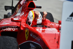 Race winner Sebastian Vettel, Ferrari SF15-T celebrates in parc ferme