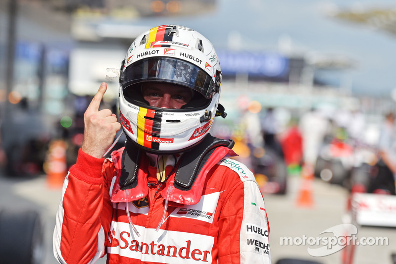 1. Sebastian Vettel, Ferrari, feiert im Parc Fermé