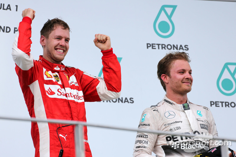 Sebastian Vettel, Scuderia Ferrari, und Nico Rosberg, Mercedes AMG F1 Team