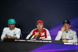 The post race FIA Press Conference, Mercedes AMG F1, second; Sebastian Vettel, Ferrari, race winner; Nico Rosberg, Mercedes AMG F1, third