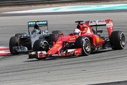 Sebastian Vettel, Scuderia Ferrari and Nico Rosberg, Mercedes AMG F1 Team