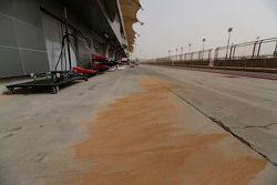 Sand in the pit lane, after a sandstorm