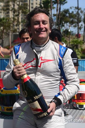 Alejandro Agag, CEO Formula E with champagne