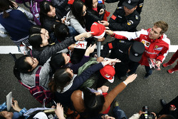 Sebastian Vettel Ferrari signs autographs for the fans