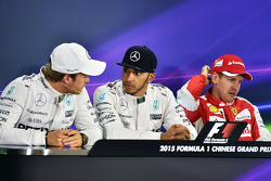 Qualifying top three in the FIA Press Conference, Mercedes AMG F1, second; Lewis Hamilton, Mercedes AMG F1, pole position; Sebastian Vettel, Ferrari, third