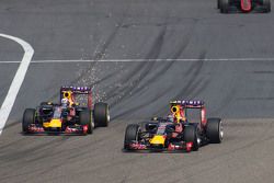 Daniil Kvyat, Red Bull Racing RB11 leads team mate Daniel Ricciardo, Red Bull Racing RB12