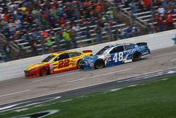 Jimmie Johnson, Hendrick Motorsports Chevrolet and Joey Logano, Team Penske Ford