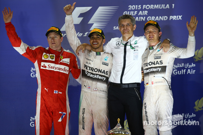 Podium: second place Kimi Raikkonen, Ferrari and winner Lewis Hamilton and second place Nico Rosberg