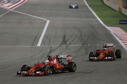 Sebastian Vettel, Ferrari SF15-T leads team mate Kimi Raikkonen, Ferrari SF15-T