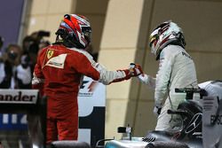 Kimi Raikkonen, Scuderia Ferrari and Lewis Hamilton, Mercedes AMG F1 Team 