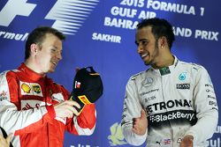 The podium,: second placed Kimi Raikkonen, Ferrari with race winner Lewis Hamilton, Mercedes AMG F1
