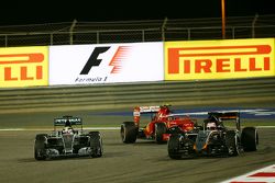 Lewis Hamilton, Mercedes AMG F1 W06 and Kimi Raikkonen, Ferrari SF15-T battle for position