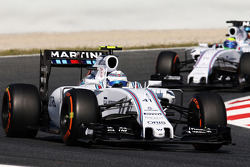Susie Wolff, Williams FW37 Development Driver leads team mate Felipe Massa, Williams FW37